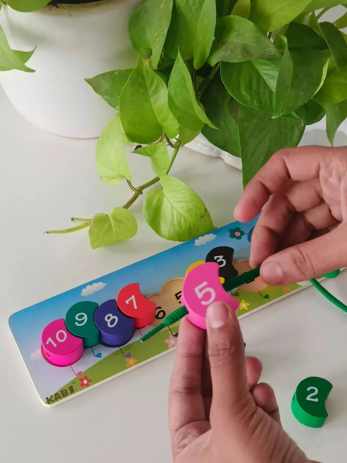 Caterpillar counting game